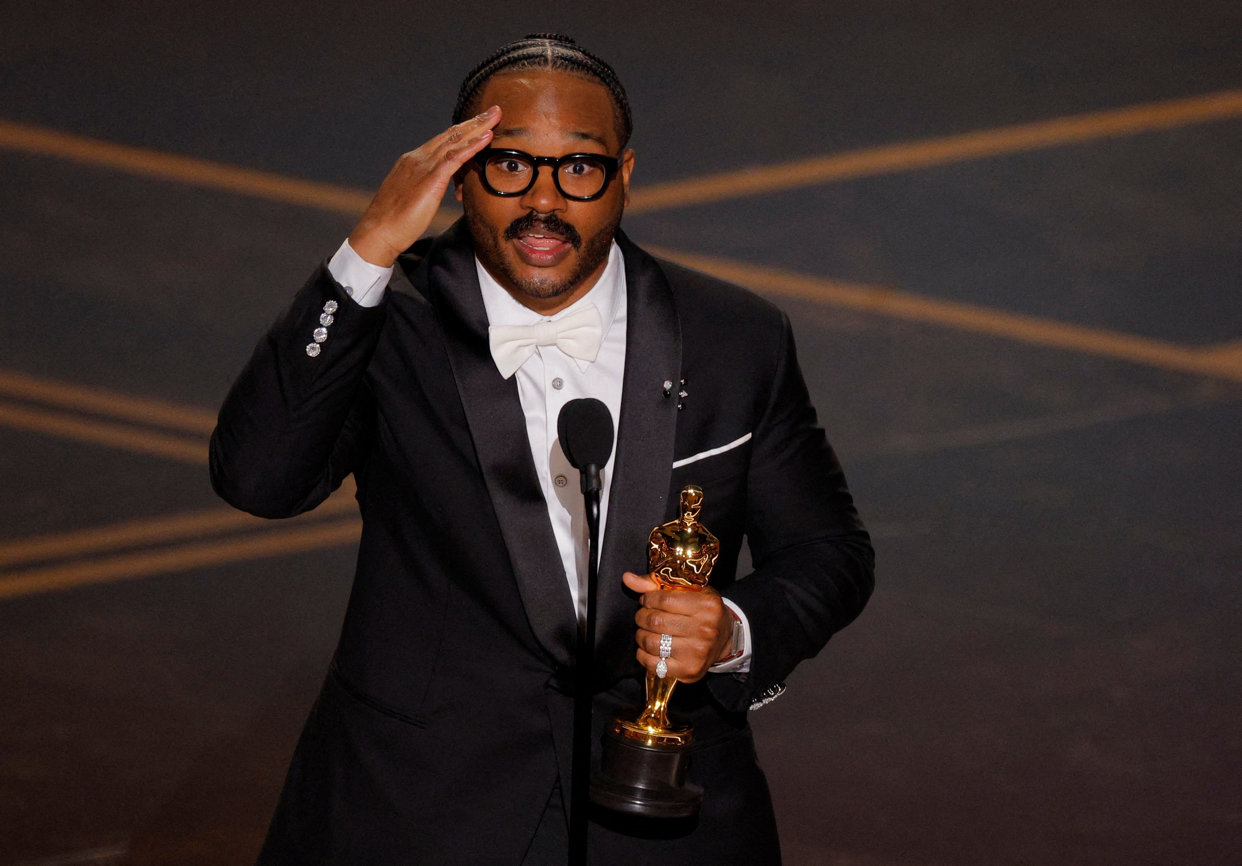 Ryan Coogler accepts the Oscar for Best Original Screenplay for Sinners. 
