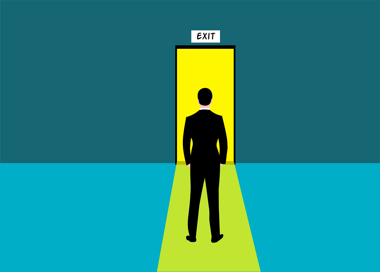 Cartoon man stands facing an exit sign