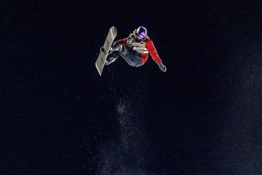 Val Guseli leaps off the side of a half pipe