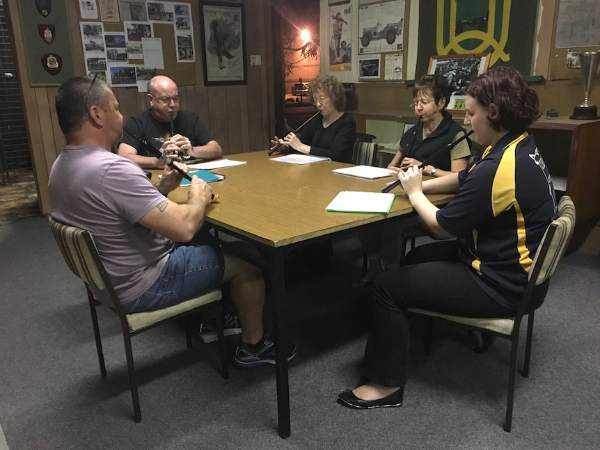 James Kelso leads pipers learning a new tune