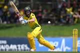 Ellyse Perry plays a shot to the leg side for Australia against England at Allan Border Field in Brisbane.