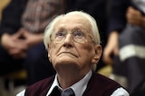 Oskar Groening, defendant and former Nazi SS officer dubbed the "bookkeeper of Auschwitz", listens to the verdict