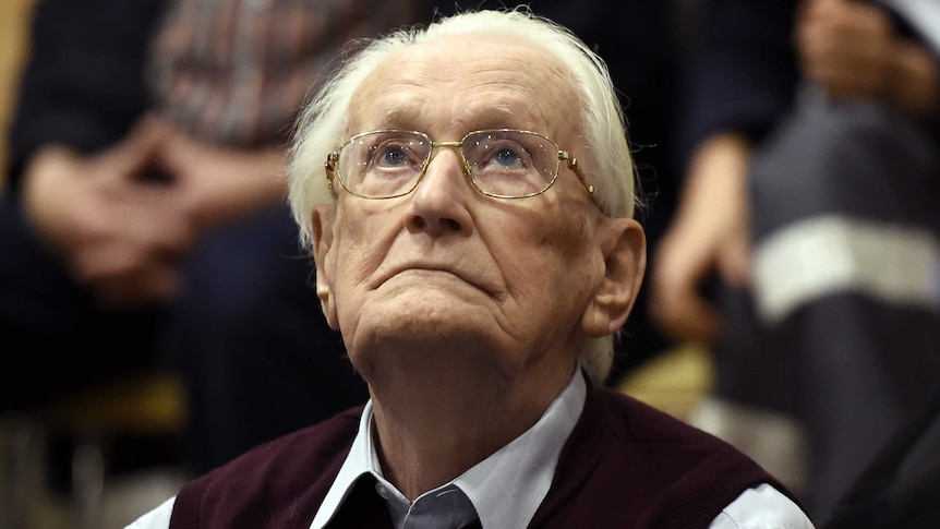 Oskar Groening, defendant and former Nazi SS officer dubbed the "bookkeeper of Auschwitz", listens to the verdict