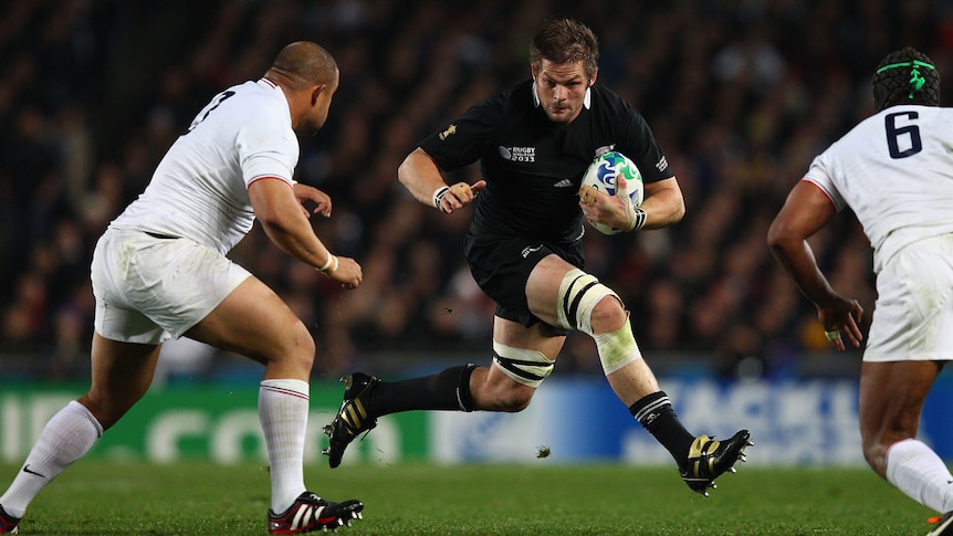 Richie McCaw running the ball for New Zealand against France