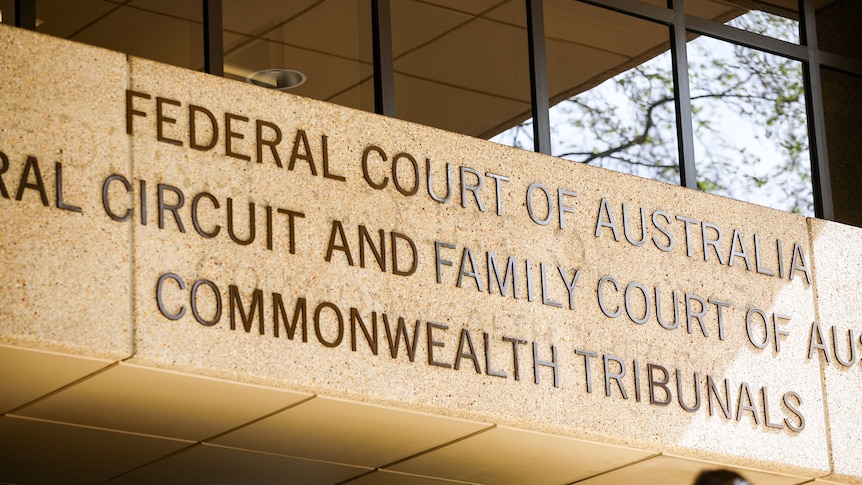A close-up of the signage outside the Federal Court of Australia building in Perth.