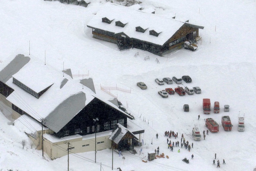 Fire trucks and ambulances are parked at a ski resort in Kusatsu, central Japan.