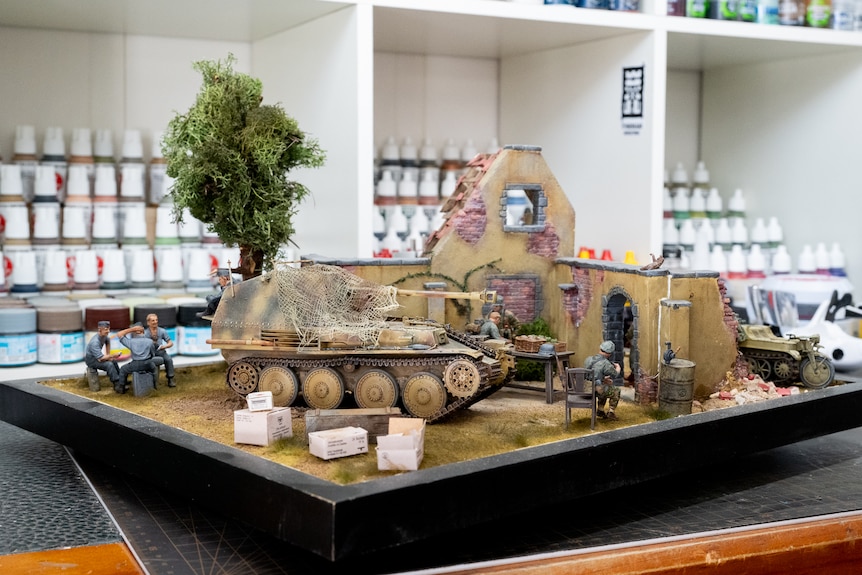 A military diorama featuring a tank.