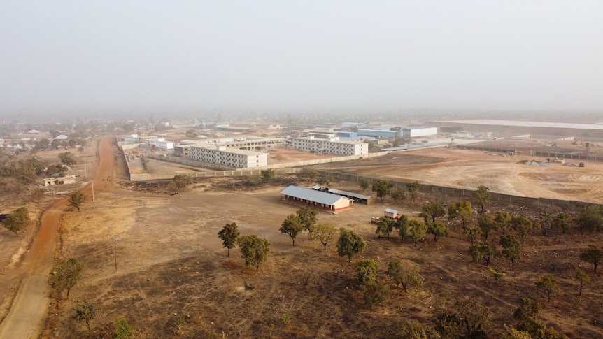  village with three story buildings in a compound