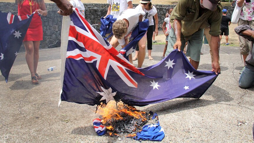 Flags burned during protest