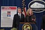 Acting US Assistant Attorney General Mary McCord speaks during a news conference at the Justice Department in Washington.