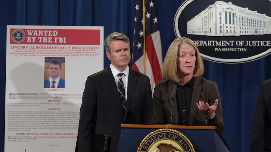 Acting US Assistant Attorney General Mary McCord speaks during a news conference at the Justice Department in Washington.