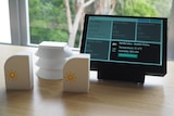 Sensors sit next to a tablet with weather information