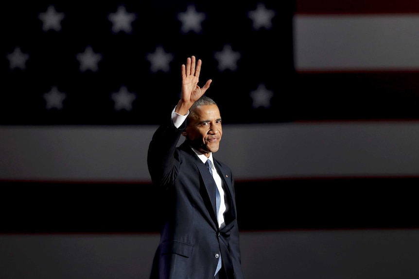 US President Barack Obama acknowledges the crowd during his farewell speech.