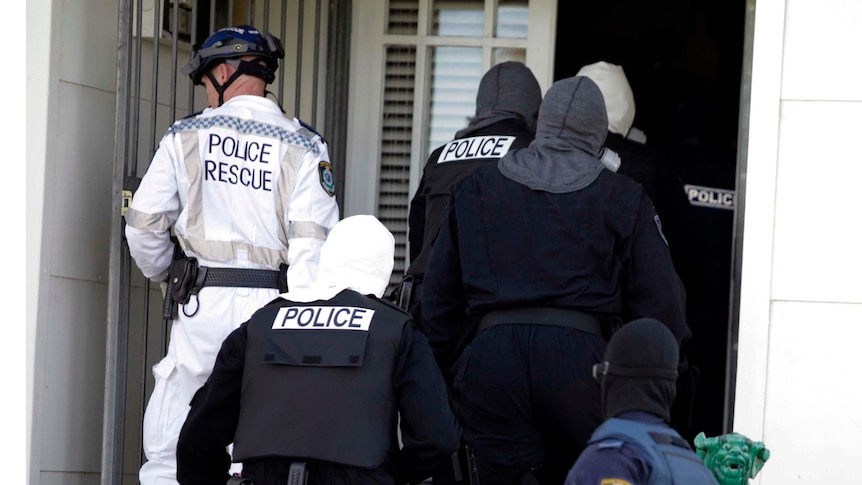 Police enter house during Sydney drug raid
