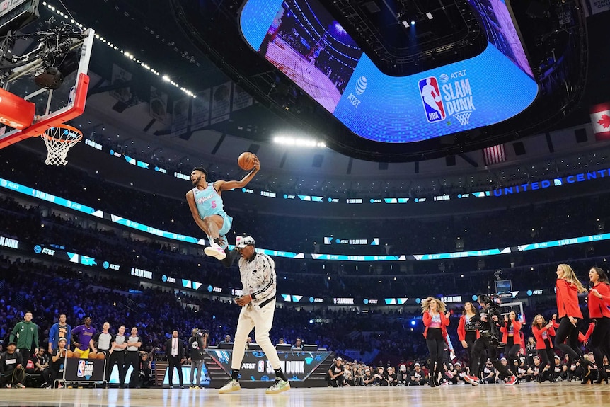 Derrick Jones Jr flies during the dunk contest