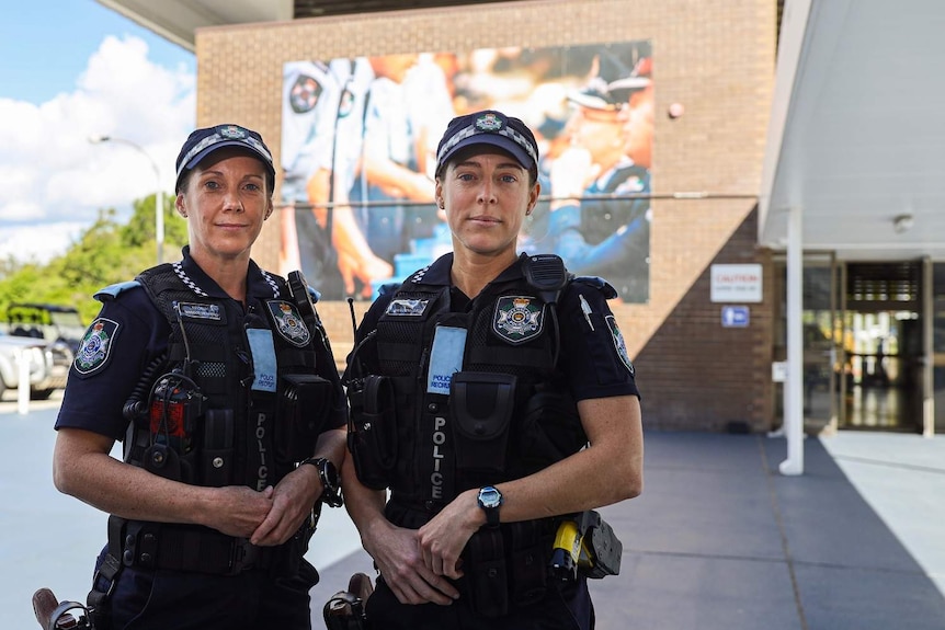 Margot Menkens (L) and Erin Donaldson standing in the Oxley police academy.