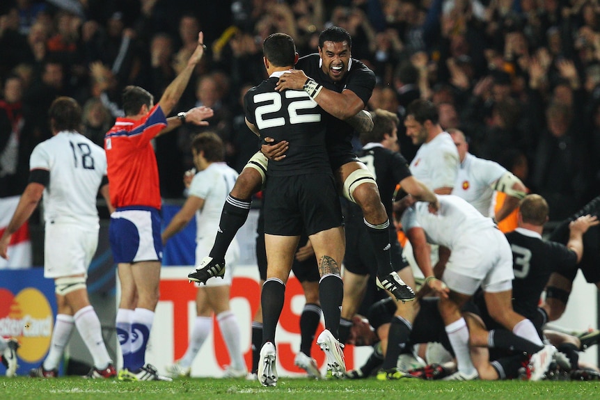 At long last: Jerome Kaino and Sonny Bill Williams celebrate World Cup triumph at the final whistle.