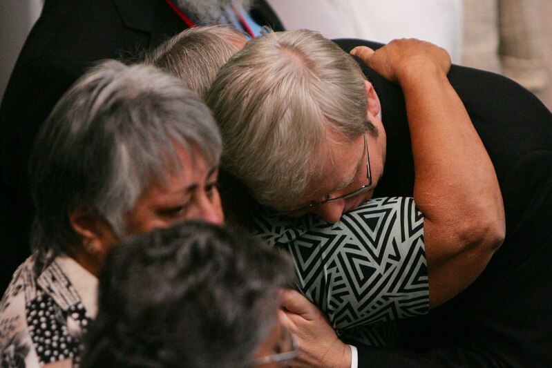 Kevin Rudd hugs an indigenous woman after delivering the apology to the stolen generations.