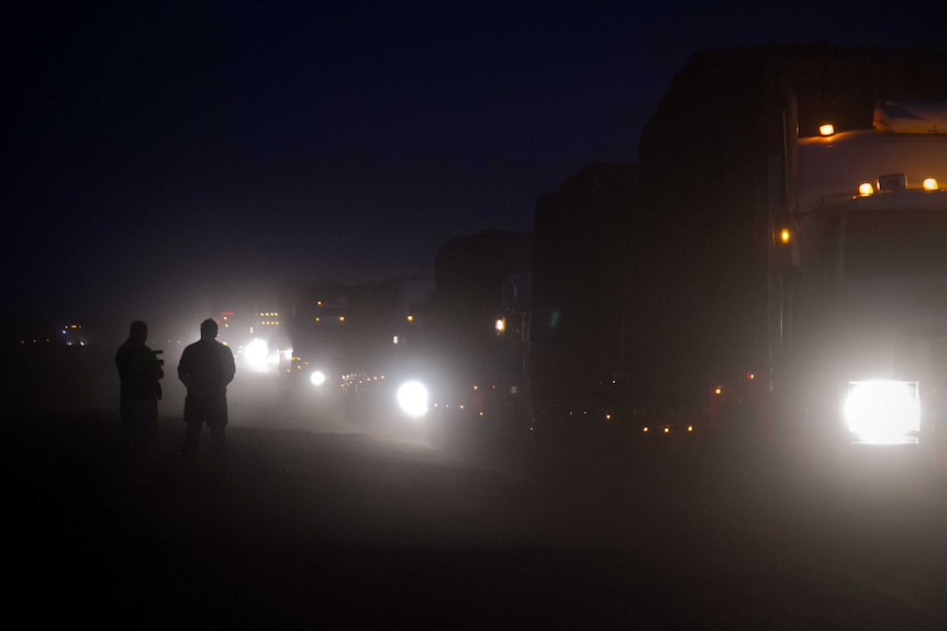 A convoy of 120 trucks has driven 1,800 kilometres to deliver almost 5,000 bales of hay