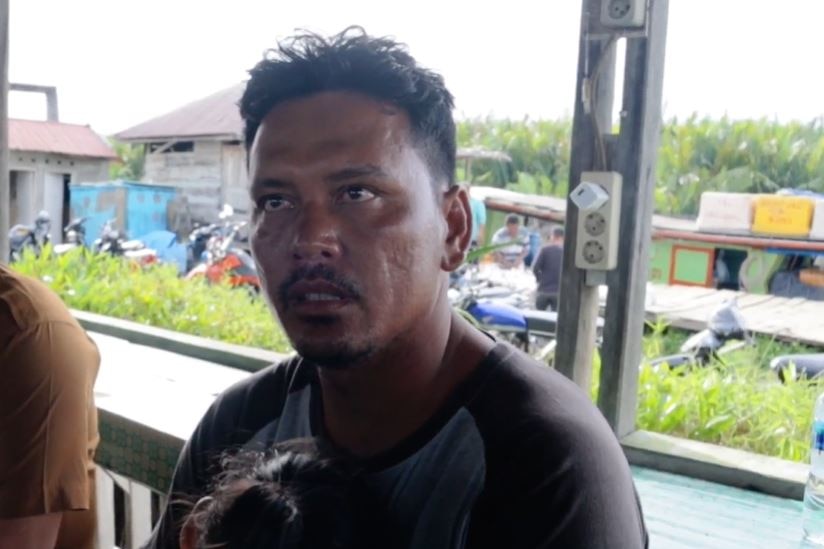 The captain of the boat, Yunardi Ardi, after his rescue. 
