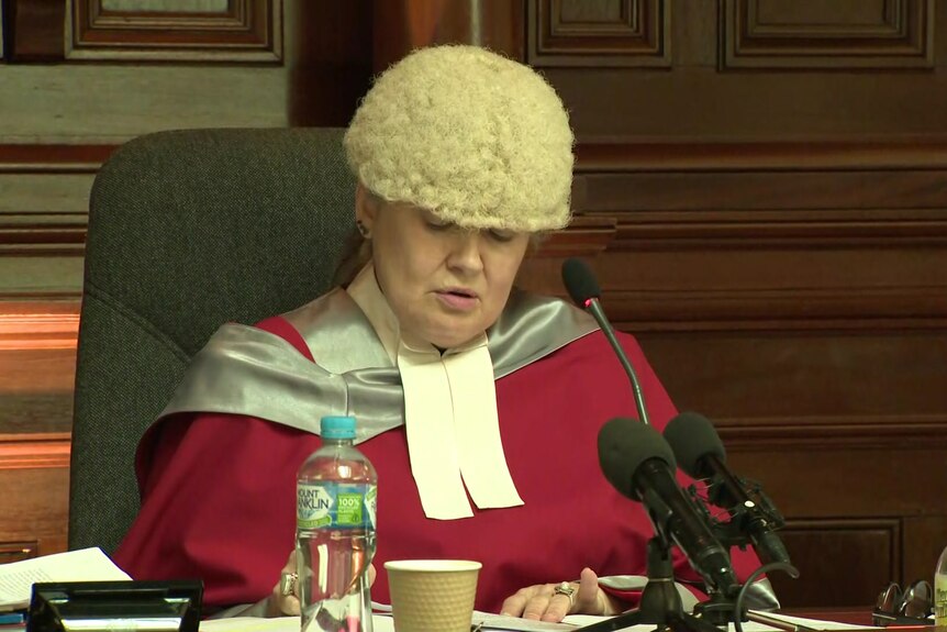 a female judge in a courtroom