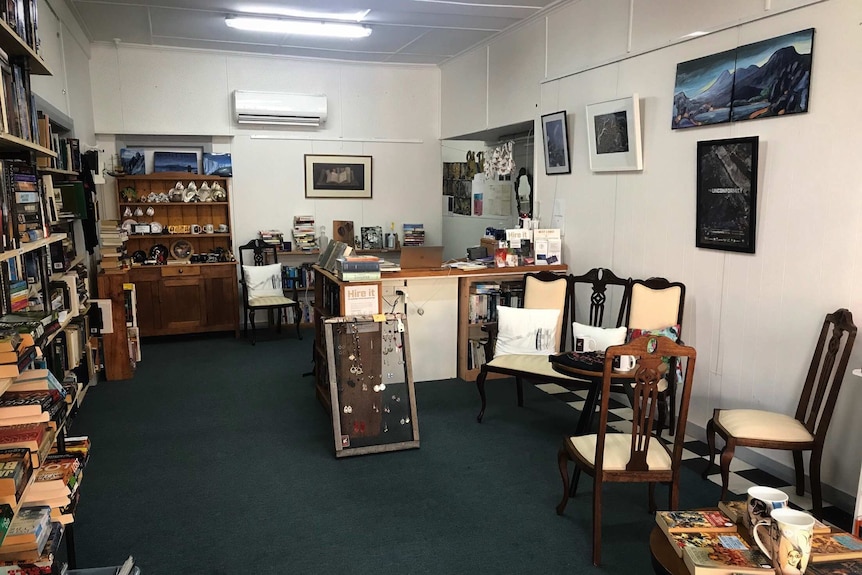 A wide shot of the interior of Missing Tiger Book Shop at Queenstown