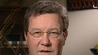 Alexander Downer says the Government is happy with advice clearing the US military commission of fraud claims. (File photo)