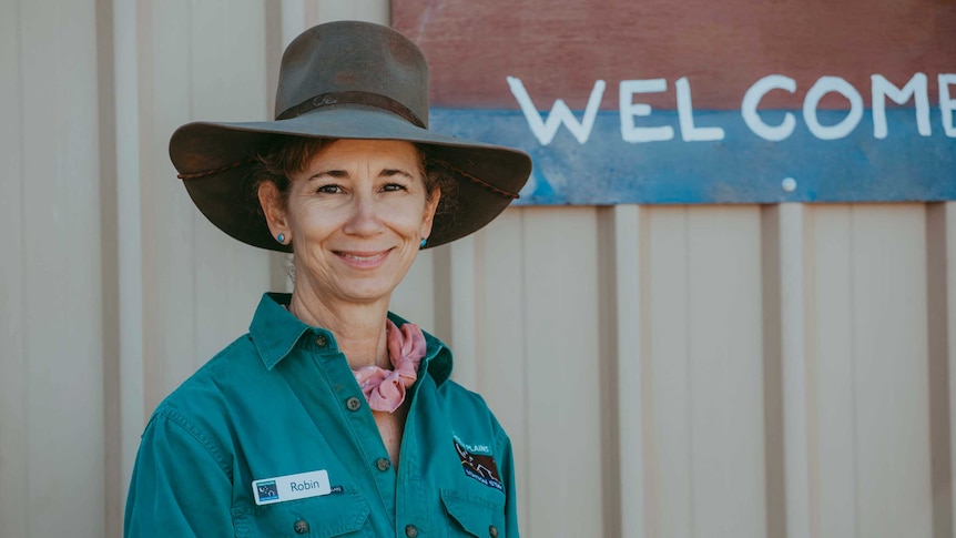 A woman in an Akubra-style hat.