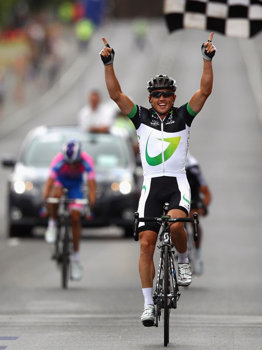 Simon Gerrans coasts to victory after a three-man battle for the finish line.