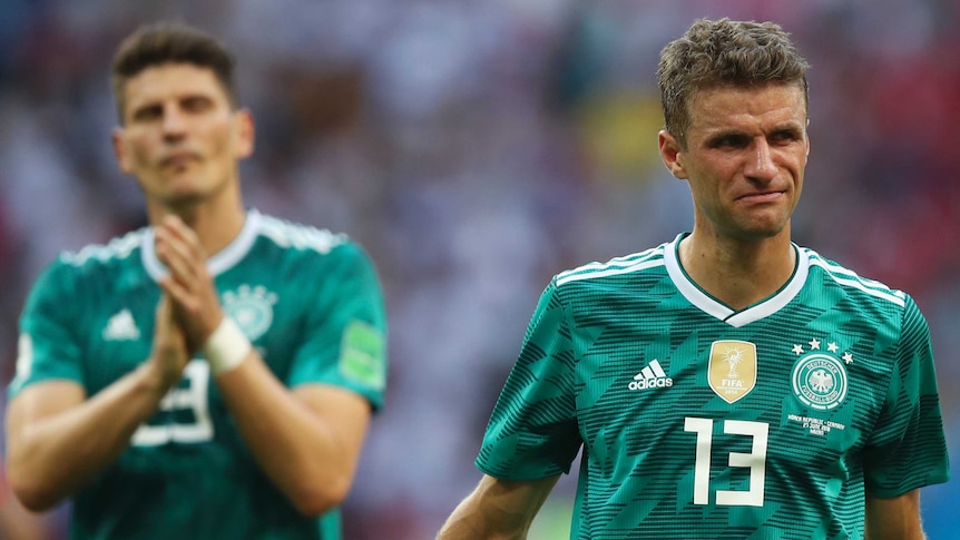 Germany striker Thomas Mueller cries after Germany was eliminated