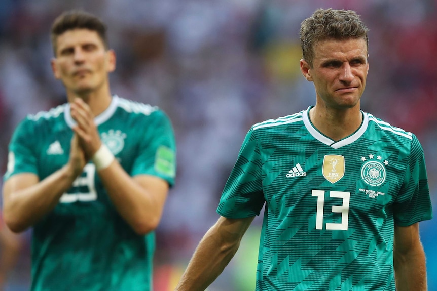 Germany striker Thomas Mueller cries after Germany was eliminated