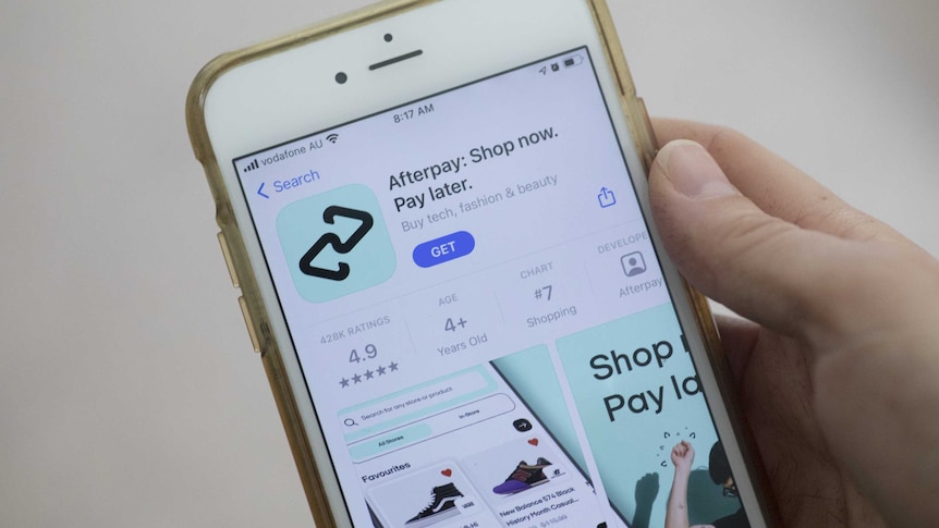 The Afterpay application download page arranged on a smartphone in Sydney, Australia, on Tuesday, Aug. 3, 2021. Square Inc., the digital-payments platform led by Twitter Inc. founder Jack Dorsey, agreed to buy Australian buy-now, pay-later company Afterpay Ltd. for $29 billion in its largest-ever acquisition.