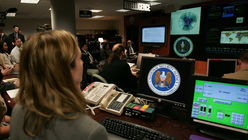 Threat assessment experts work inside NSA