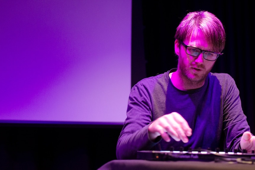 Tom Spencer uses his Ableton Live Push device at the Ableton User Group Melbourne meet-up