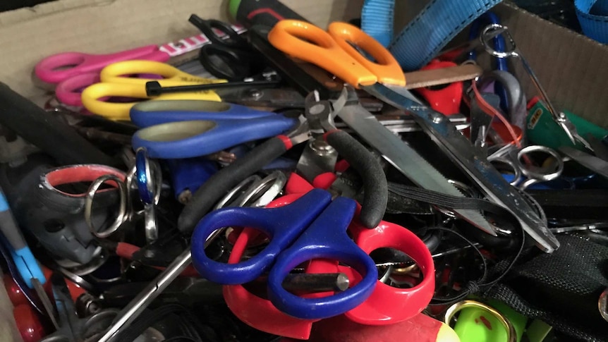 Piles of scissors are lost to airport security every month