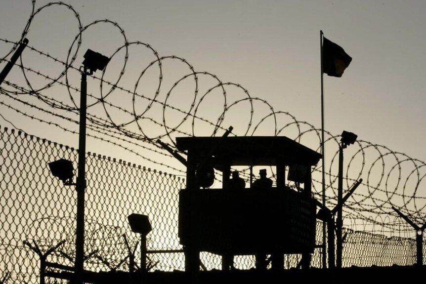 Troops stand guard at Camp Delta in Guantanamo Bay. (Reuters)
