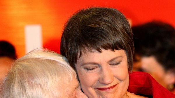 Miss Clark embraces her mother Margaret after conceding defeat.