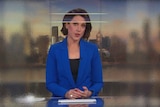 Tamara Oudyn sits at the newsdesk, with a film of distortion covering her face.