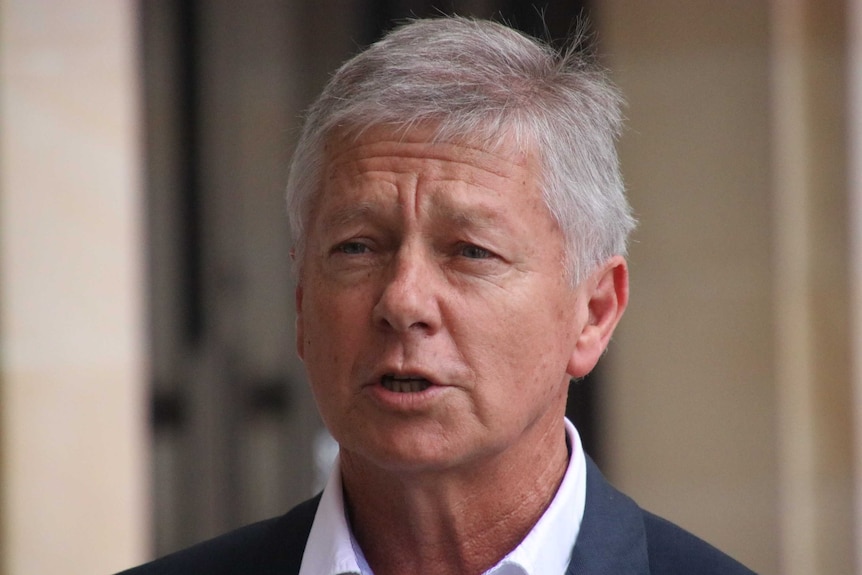 WA Liberal health spokesman Bill Marmion being interviewed by reporters outside State Parliament