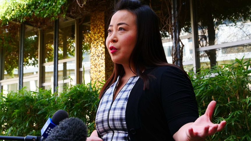 Elizabeth Lee addresses the media outside the ACT Legislative Assembly.