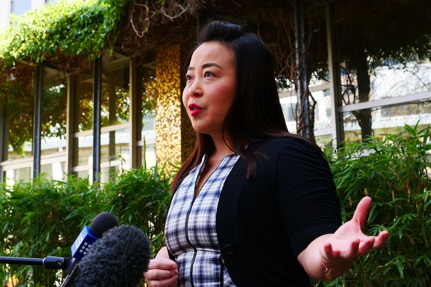 Elizabeth Lee addresses the media outside the ACT Legislative Assembly.