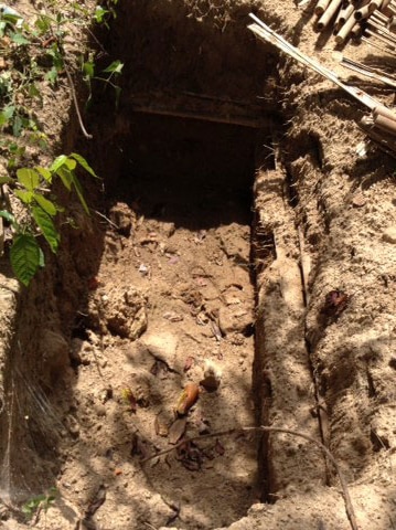 Exhumed grave in jungle near Thai-Malaysia border