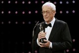 Actor Sir Michael Caine accepts his honoury award during the 28th European Film Award ceremony