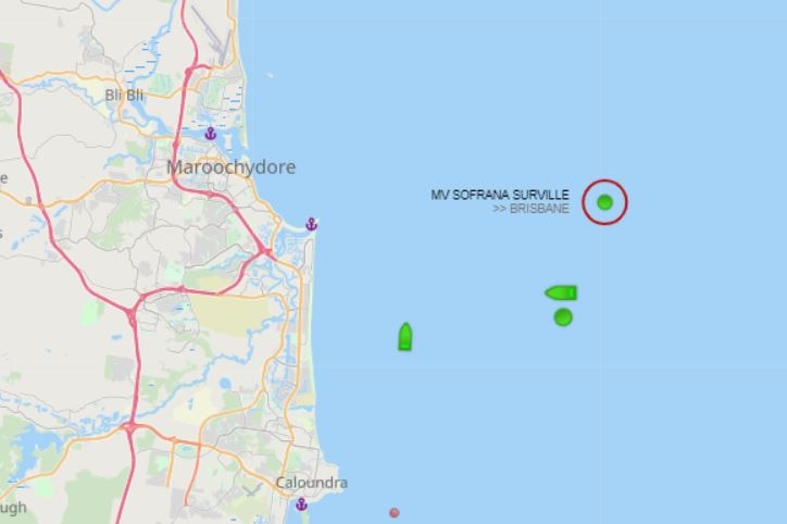 A map showing coastline and a green circle at sea depicting where a ship is at anchor