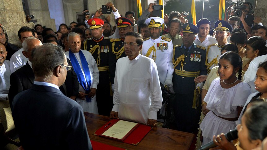 Newly elected Sri Lankan president Maithripala Sirisena takes oath as he is sworn into office
