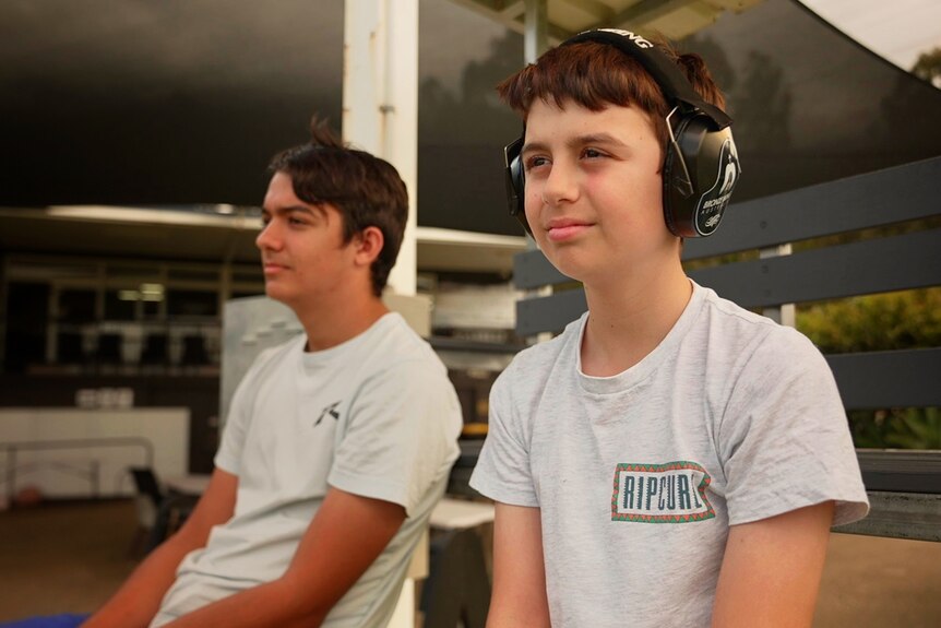 William and Nathan with ear protectors on