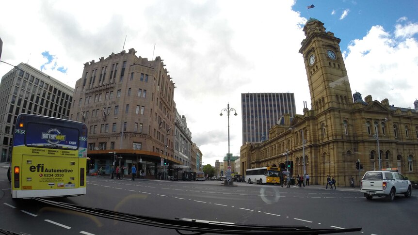 Looking into the Elizabeth Street bus mall from the front of a bus in Hobart