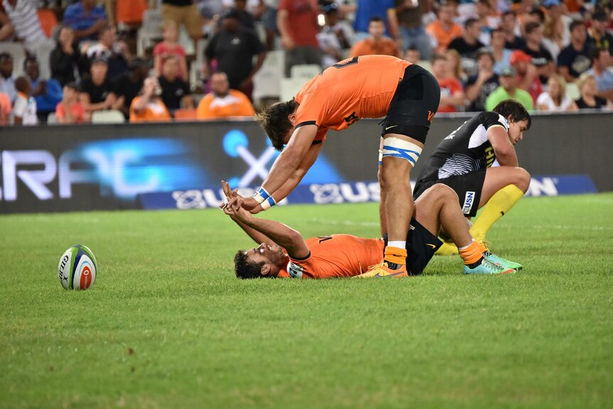 Jaguares players celebrate their first Super Rugby win