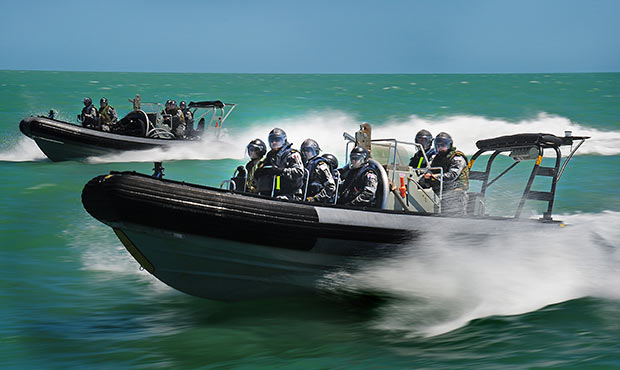Attack One personnel from HMAS Albany proceed to a simulated suspected irregular entry vessel (ADF: Leading Seaman Andrew Dakin)