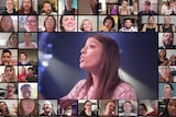 Screen shot of people singing.